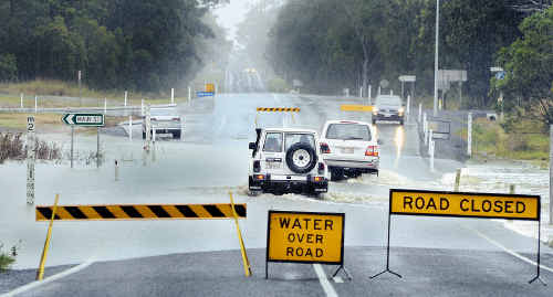 Booral Road near Main Street was closed yesterday and police were warning motorists not to drive through as wet weather pounded the Fraser Coast. Booral Road near Main Street was closed yesterday and police were warning motorists not to drive through as wet weather pounded the Fraser Coast.